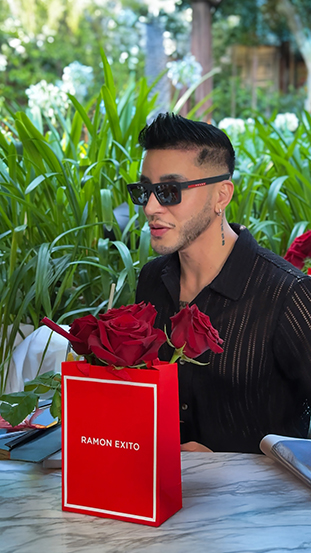 Ramon Éxito perfume with roses