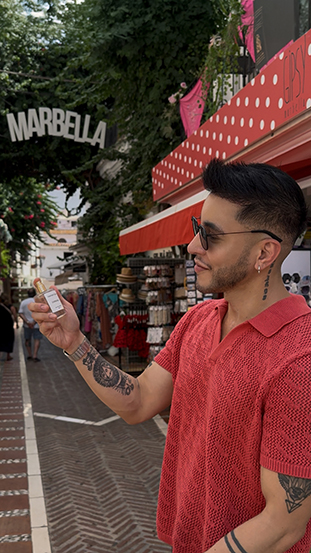 Ramon Natcher with Dinero perfume in Marbella